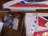 a box with a pair of skateboards in it