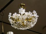 a chandelier that is hanging from the ceiling