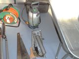 many tools that are sitting on the floor of the room