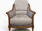 a close up of a chair with a gray upholstered seat