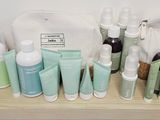 many different types of skin care products displayed on a shelf