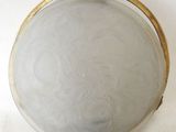 an image of a white purse with a gold handle