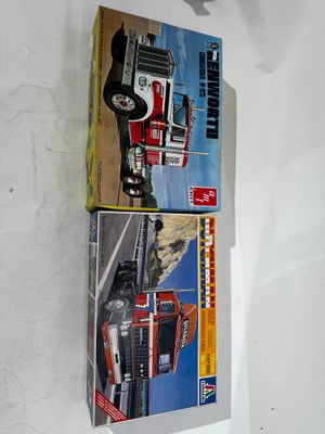 two boxes of toys on the wall of a room