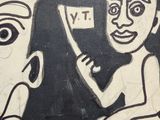 a painting of a man and a woman on the wall