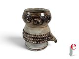 an image of a ceramic owl mug on a white background
