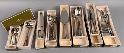 six sets of silverware in a box on a table