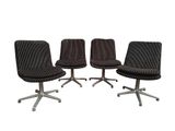 lot de quatre chaises pivotantes de style moderne du milieu du siècle