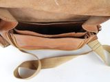 a brown bag with a tan strap on it