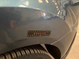 a close up of a sticker on the side of a car