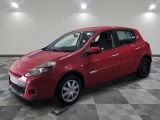 a picture of a red car parked in a garage
