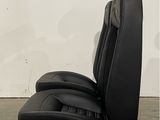 an image of a black reclining chair with headrests