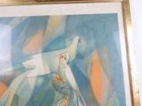a picture of a painting of a white bird in a gold frame