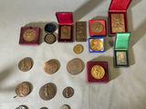 a lot of coins that are sitting on a table