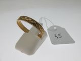 an image of a ring with a tag attached to it