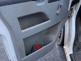 the door of a car with the driver ' s door open and the driver ' s side door open