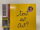 a picture of a yellow book with a picture of a man on it