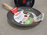 a frying pan and a frying pan on a table