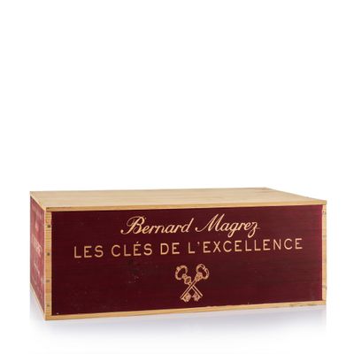 the wooden box is holding a bottle of wine and a bottle of wine
