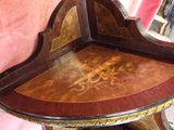 a wooden table with a decorative design on it