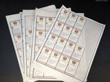 four sheets of white paper with a blue border and a picture of a basket of grapes