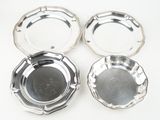 three silverplated ashtrays on a white background