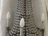 a chandelier that is hanging from the ceiling