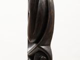 sculpture of a woman ' s head on a pedestal with a white background