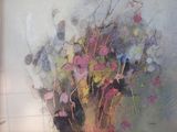 une peinture de fleurs dans un vase sur une table