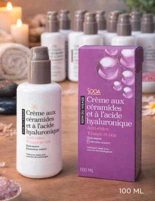a bottle of cremeux and a box of cremeuxs on a table