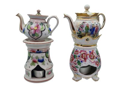two teapots and a tea pot sitting on top of each other