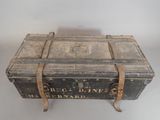 an old trunk that is sitting on a table