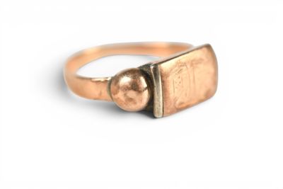 an image of a gold ring on a white background
