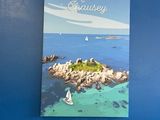 a blue wall with a picture of a sailboat on it