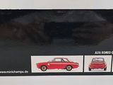 the box is open to show the contents of a model car