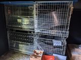 a cage that has a bunch of birds inside of it