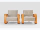 pair of lounge chairs in the style of the sixties