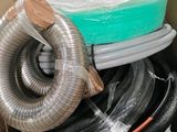 a box full of different types of pipes and hoses