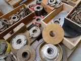 many different types of metal parts in a box