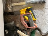 many tools that are laying on the floor next to each other