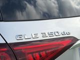 a close up of a car ' s tail lights and the back end of it