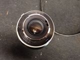 a close up view of a camera lens on a table