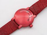an image of a close up of a wrist watch on a white surface