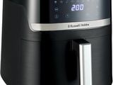 a close up of an air fryer on a white background