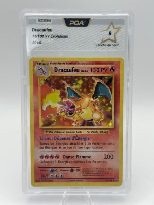 a close up of a pokemon card in a plastic holder