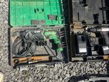 a box that has some tools in it on the ground