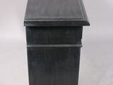 a black wooden desk with a drawer on top of it