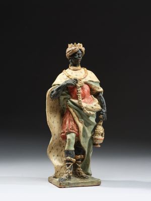 une image représentant la statue d'un homme tenant un panier