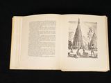 an open book with a drawing of a sailboat on it