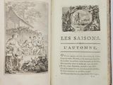 an open book with a picture of a group of people in a garden