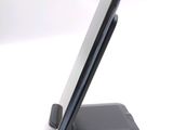 a cell phone that is sitting on top of a stand